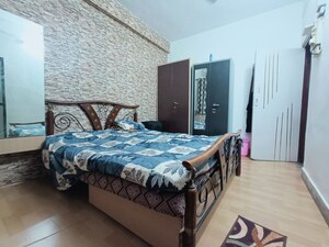 Bedroom in 2 BHK Apartment at Planet Powai CHS, Powai – for Rent