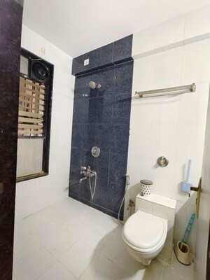 Bathroom in 4 BHK Apartment at Mont Vert Belair, Bhugaon – for Rent