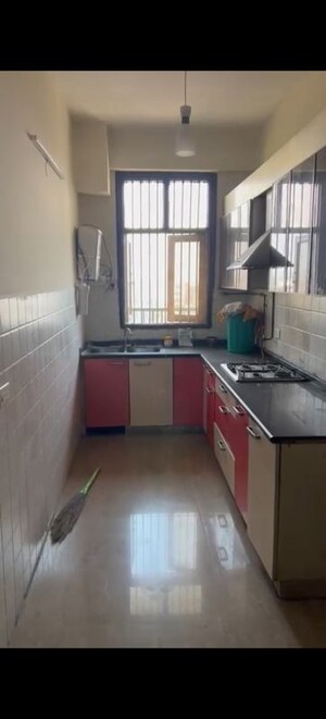 Kitchen in 3 BHK Apartment at Saya Desire Residency, Ahinsa Khand 2 – for Sale