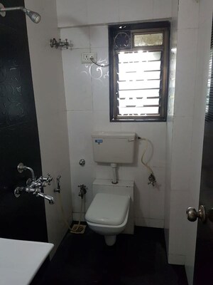 Bathroom in 3 BHK Apartment at Omkar Alta Monte, Malad East – for Rent