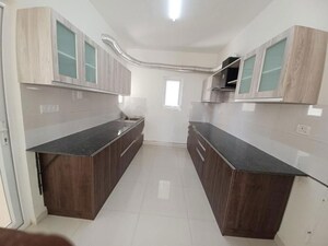 Kitchen in 3 BHK Apartment at Godrej Aqua, International Airport Road – for Rent