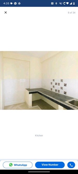 Kitchen in 1 BHK Apartment at Eureka Diya Green City, Raj Nagar Extension – for Sale