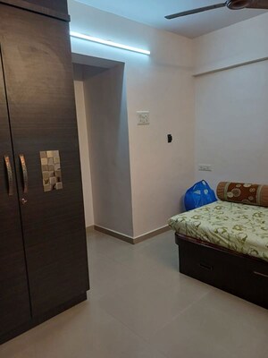 Bedroom in 1 BHK Apartment at Sujata Palace, Dombivli West – for Rent