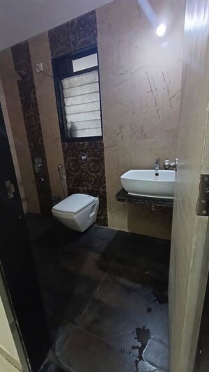 Bathroom in 2 BHK Apartment at Nisarg Hyde Park, Kharghar – for Rent