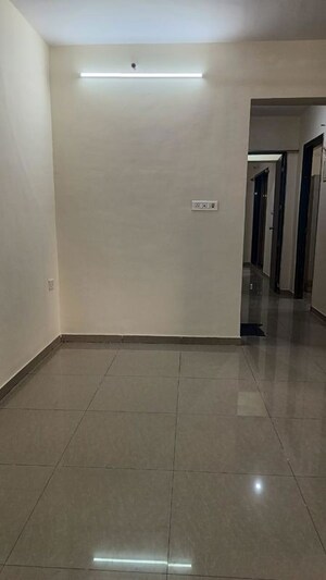 Living Room in 2 BHK Apartment at Nisarg Hyde Park, Kharghar – for Rent