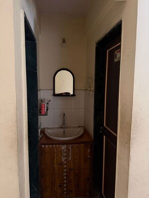 Bathroom in 2 BHK Apartment at Wadgaon Sheri – for Rent