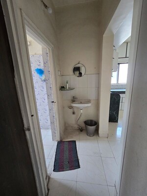 Bathroom in 1 BHK Apartment at Wadgaon Sheri – for Rent