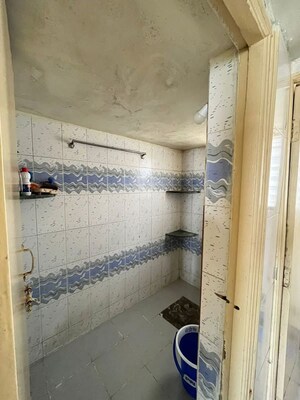 Bathroom in 1.5 BHK Apartment at Wadgaon Sheri – for Rent