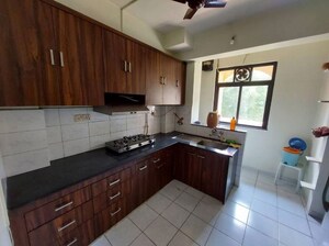 Kitchen in 1 BHK Apartment at Hiranandani Estate Carrara, Ghodbunder Road – for Rent