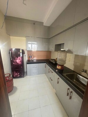 Kitchen in 2 BHK Apartment at Siddharth Vihar – for Sale
