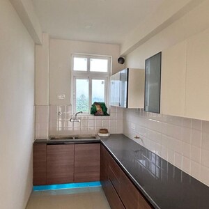 Kitchen in 3 BHK Apartment at Maxxus Elanza, Nagla Road – for Rent