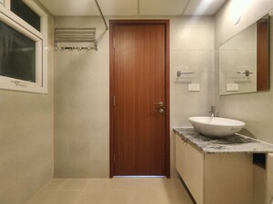 Building Lobby in 2 BHK Apartment at Bhartiya Nikoo Homes Phase 2, Thanisandra Main Road – for Rent