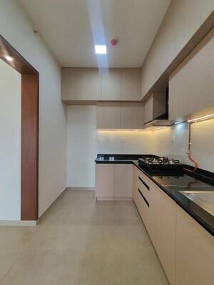 Kitchen in 2 BHK Apartment at Bhartiya Nikoo Homes Phase 2, Thanisandra Main Road – for Rent