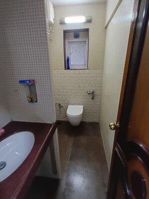 Bathroom in 3 BHK Apartment at Lokhandwala Whispering Palms, Kandivali East – for Rent