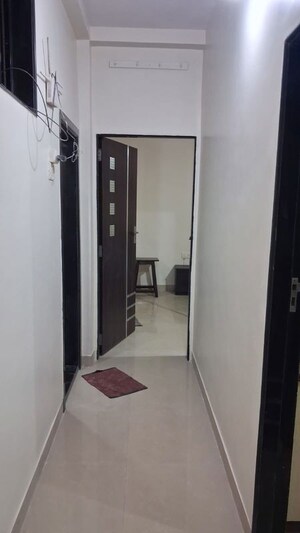Building Lobby in 2 BHK Apartment at Tilak Nagar – for Rent