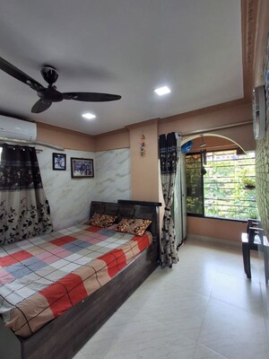 Bedroom in 2 BHK Apartment at Rajashree Deep CHS, Kolbad – for Sale