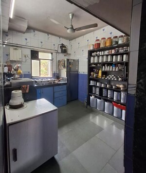 Kitchen in 2 BHK Apartment at Rajashree Deep CHS, Kolbad – for Sale