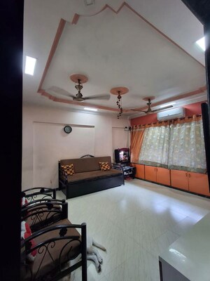 Living Room in 2 BHK Apartment at Rajashree Deep CHS, Kolbad – for Sale