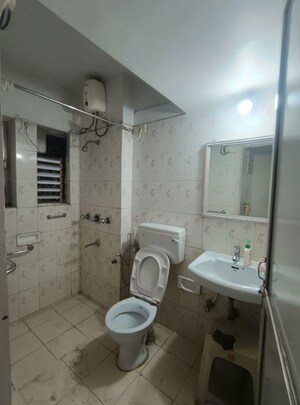 Bathroom in 1 BHK Apartment at Tata Glendale, Vasant Vihar – for Sale