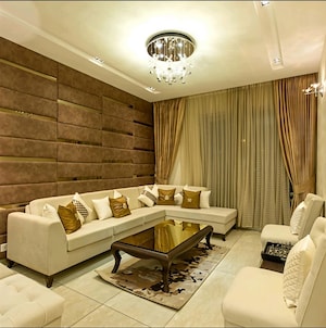 Living Room in 4 BHK Apartment at Exotic Grandeur, Baltana – for Sale