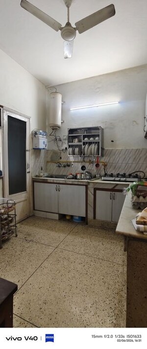 Kitchen in 2.5 BHK Apartment at Defence Colony – for Rent