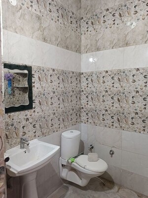 Bathroom in 3 BHK Builder Floor at Dhakoli – for Rent
