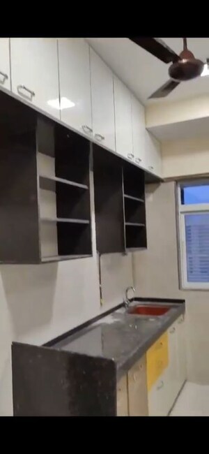 Kitchen in 2 BHK Apartment at Dhoot Sky Residency New Sonali CHSL, Malad West – for Rent
