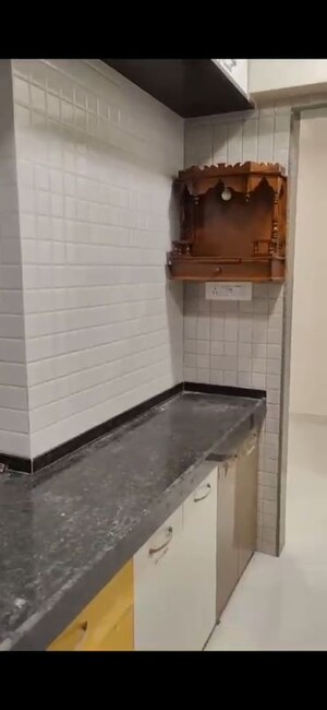 Kitchen in 2 BHK Apartment at Dhoot Sky Residency New Sonali CHSL, Malad West – for Rent