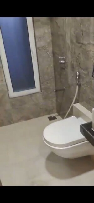 Bathroom in 2 BHK Apartment at Dhoot Sky Residency New Sonali CHSL, Malad West – for Rent