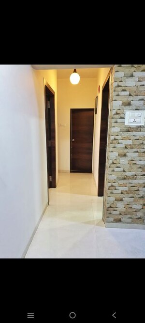 Building Lobby in 2 BHK Apartment at Dheeraj Gaurav Heights, Jogeshwari West – for Rent
