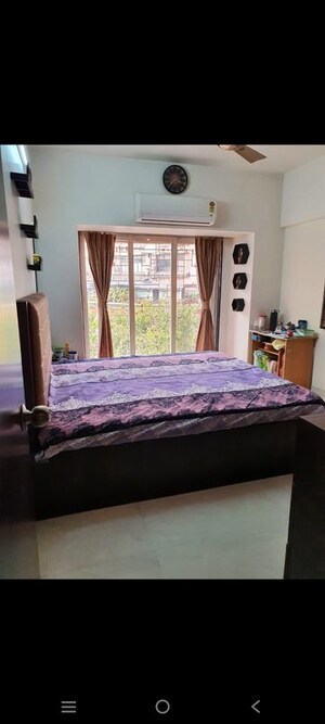 Bedroom in 2 BHK Apartment at Dheeraj Gaurav Heights, Jogeshwari West – for Rent