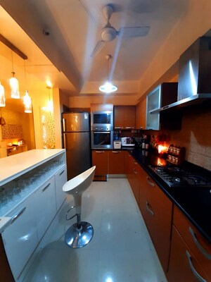 Kitchen in 3 BHK Apartment at Puri Aanandvilas, Sector 81 – for Sale