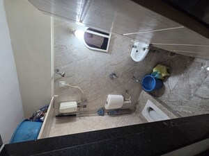 Bathroom in 1 BHK Apartment at Kuber Varshatai Tower, Kurla – for Rent