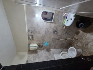 Bathroom in 1 BHK Apartment at Kuber Varshatai Tower, Kurla – for Rent