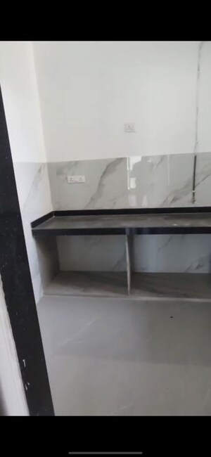 Kitchen in 2 BHK Apartment at Dev Leo Tower, Oshiwara – for Rent