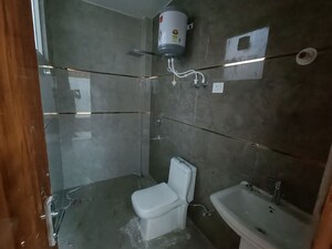 Bathroom in 1 RK Builder Floor at Kohli One Malibu Town, Sector 47 – for Rent