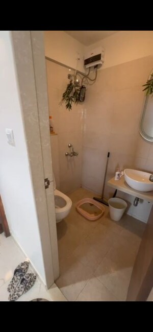 Bathroom in 1 BHK Apartment at JP Eminence, Andheri West – for Rent