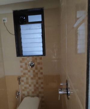 Bathroom in 1 BHK Apartment at Sethia Kalpavruksh Heights, Kandivali West – for Rent