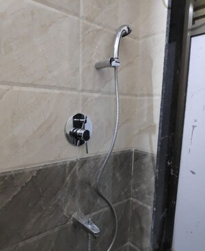 Bathroom in 1 BHK Apartment at Sethia Kalpavruksh Heights, Kandivali West – for Rent