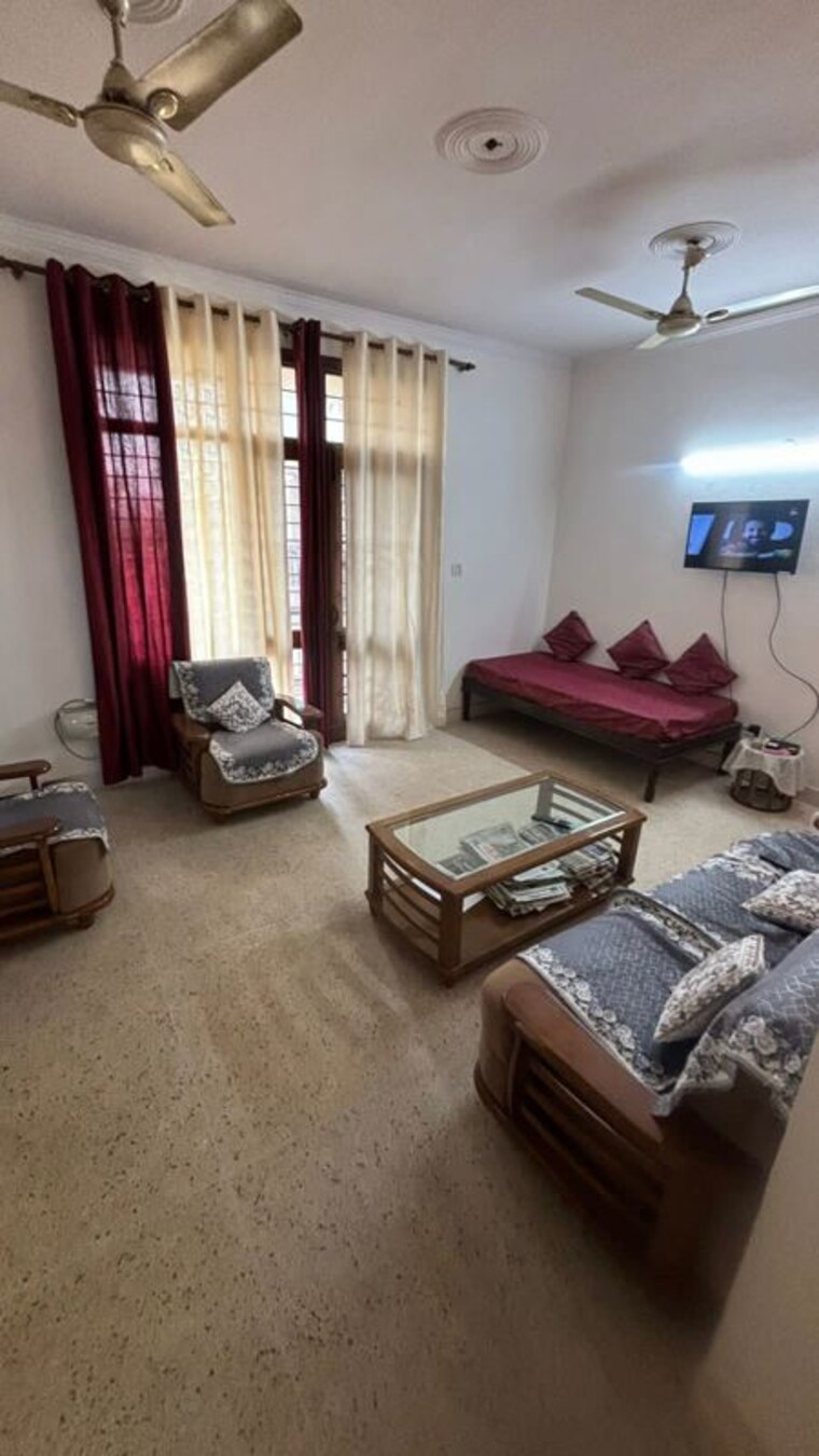 Living Room, garima-vihar-apartments 3.5 Bedroom 1800 Sq.Ft. Apartment In Sector 35 Noida 10181996