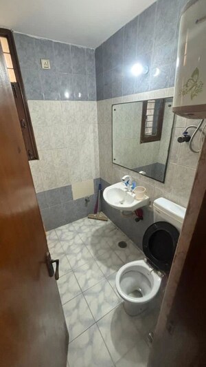 Bathroom in 3.5 BHK Apartment at Garima Vihar Apartments, Sector 35 – for Sale