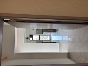 Building Lobby in 2 BHK Apartment at Shapoorji Pallonji Alpine, Kandivali East – for Rent