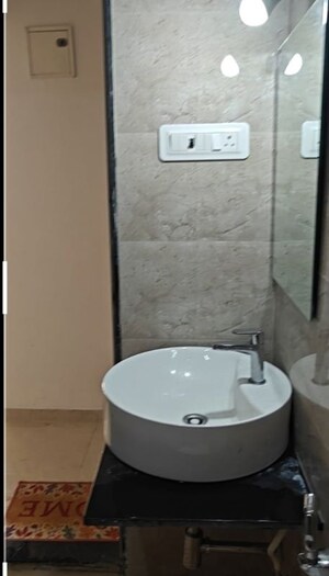 Bathroom in 1.5 BHK Apartment at Godrej Emerald, Ghodbunder Road – for Rent