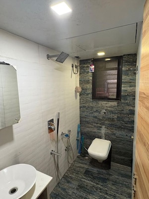 Bathroom in 2 BHK Apartment at Metropolis Rivera, Kasarvadavali – for Rent