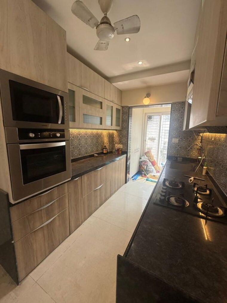 Kitchen, seasons-trimurti 2 Bedroom 700 Sq.Ft. Apartment In Santacruz West Mumbai 10182149