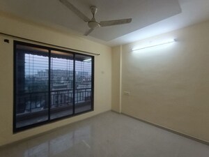 Room in 2 BHK Apartment at Shiv Simiran, Kopar Khairane – for Sale