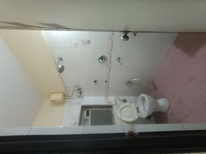 Bathroom in 2 BHK Apartment at Shiv Simiran, Kopar Khairane – for Sale