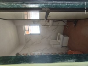 Kitchen in 2 BHK Apartment at Kopar Khairane Sector 1 – for Sale