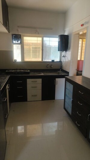 Kitchen in 2 BHK Apartment at GK Rose Valley, Pimple Saudagar – for Rent