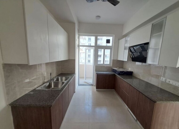 Kitchen, vatika-sovereign-park 4 Bedroom 3300 Sq.Ft. Apartment In Sector 99 Gurgaon 10182245